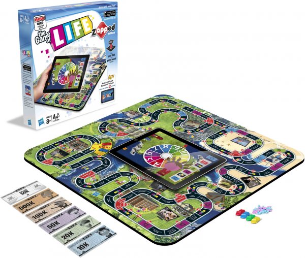 Foto 0 en  - zAPPed: tableros de The Game of Life y Monopoly con un iPad en el centro